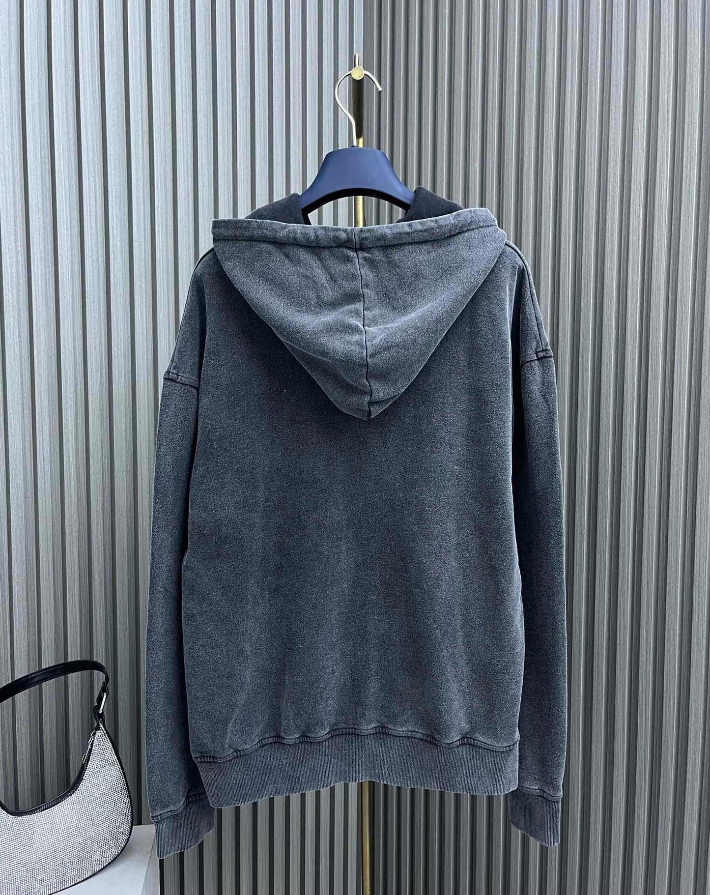 Distressed fashionable hooded sweatshirt