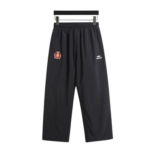 Manchester United embroidered panel woven trousers